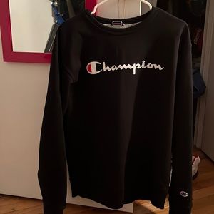 Black champion sweatshirt with white and red letters